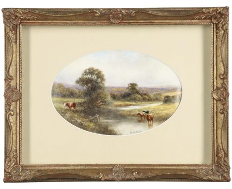 An oval shaped porcelain plaque in the Royal Worcester style, hand painted with Cattle by a stream and within a landscape sce