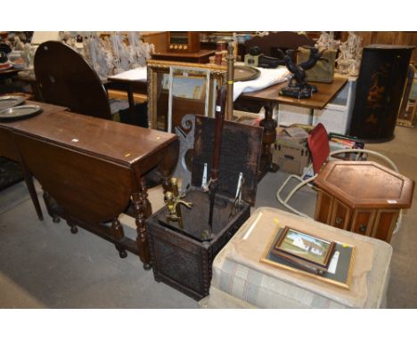 A brass adjustable lamp standard  AF; a carved oak coal box and contents to include companion stand; brass cream skimmer and 
