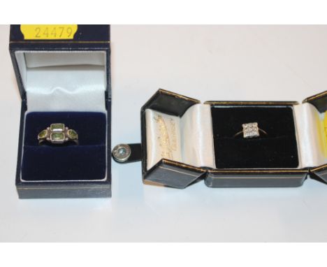 A white metal ring set four green stones AF; and a 9ct gold ring set with white stones, ring size K, approx. 1.2gms 