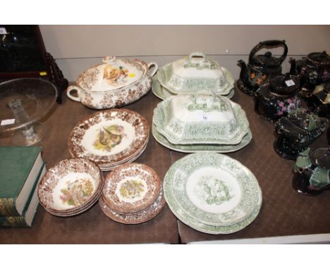 A collection of Copeland and Garrett tureens and plates and a collection of Royal Worcester "Palissy" games series dinnerware