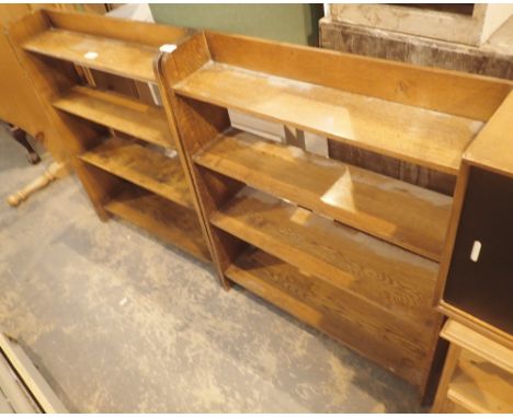 Two four shelf bookcases 