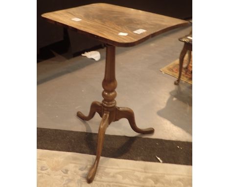 Georgian walnut tilt top table on tripod supports 