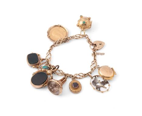 A 9ct gold Celtic weave charm bracelet, with heart shaped padlock clasp and nine various charms including a George V full sov