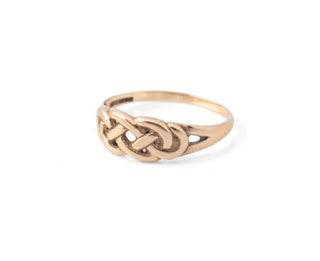 A 9ct yellow gold ring with Celtic knot design. Ring size R. Weight 1.9g.