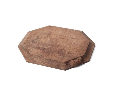 Robert 'Mouseman' Thompson bread board, carved mouse to side, 30.5cm x 26cm.