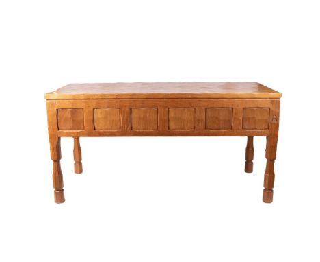 Knightman Family: Old Mill Furniture (Balk): a light oak coffee table, rectangular top, recessed trade mark, panelled sides, 