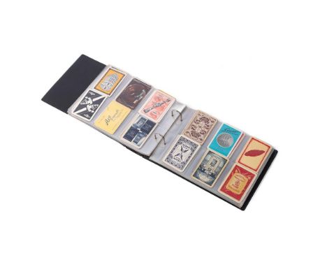 A collection of advertising playing cards to include one card from each company housed in a display folder. Companies include