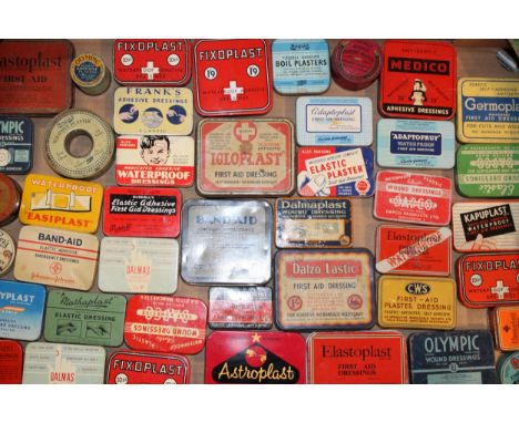 A collection of advertising tins relating to first aid to include plaster tins, band - aids and other similar examples. (Qty)