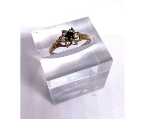 A small &lsquo;sapphire&rdquo; cluster ring, with paste white stones, 9 carat gold setting, size O, 1.5g (gross); also a whit