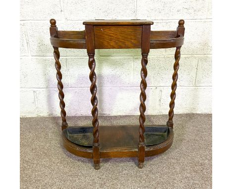 A vintage oak demi lune stick stand, with hinged compartment; also a decorative wall mirror (2)