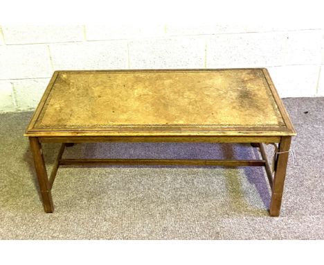 An Edwardian octagonal topped two tier occasional table; a drop leaf small table and a vintage leather topped coffee table (3