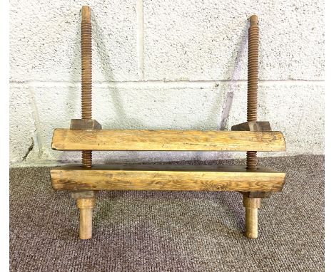 A vintage pine press, with turned wood screws and pine press blocks