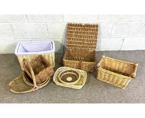 A handy selection of wicker baskets, including a cut flower basket, hamper, two upholstered baskets etc (ideal for Christmas 