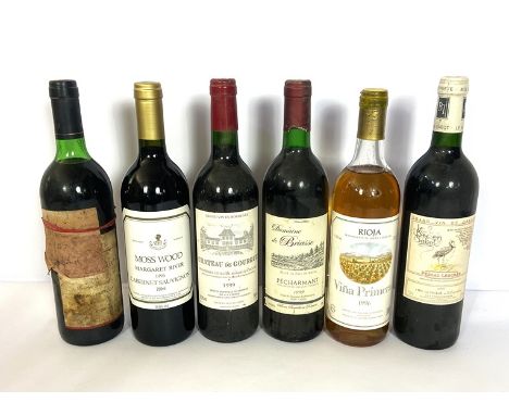 A selection of vintage red wine, including: Grand Puy Ducasse, Pauillac, 2004, 1 bottle; Chateau Marbuzet 2002, 1 bottle; Cha