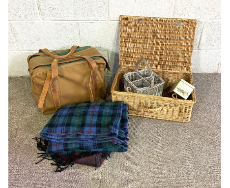 A wicker picnic hamper, wine carrier and useful canvas bag with multi section drinks compartments; also tartan picnic rugs (a