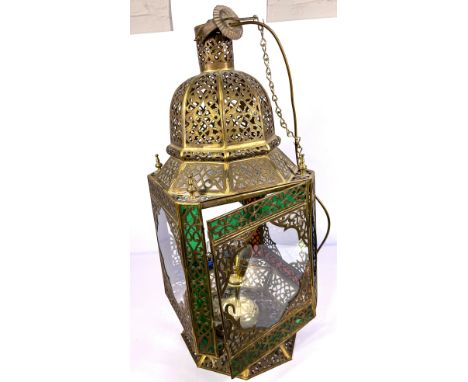A large gilt metal Moroccan hall lantern, with pierced and decorative sides and domed top, 20th century  bought by the owner 