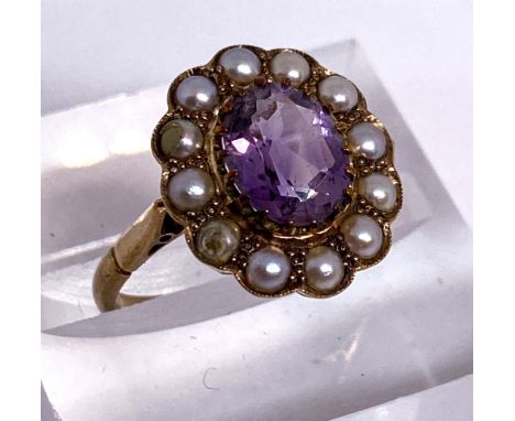 A vintage amethyst and pearl ring, yellow metal setting, marked 9ct, ring size Q, 4g (gross); also an oval aquamarine pendant