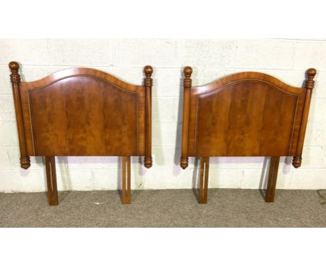 A pair of modern veneered Victorian style single bed heads, with turned finials; also a hostess trolley and a CD cabinet, wit