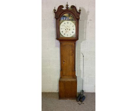 A Victorian oak cased eight day longcase clock, signed Davidson, with a painted arched dial, two train movement, the case wit