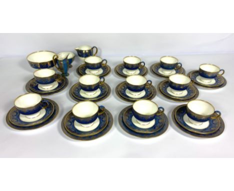 A selection of tea wares, including a Wedgwood 12 place tea service, with cups, saucers, and plates, also two jugs and two bo