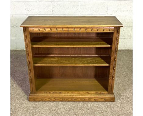 A useful Ercol small beechwood open bookcase, with Ercol label, 20th century, 96cm wide, 92cm high