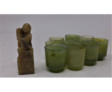 A set of 10 early 20th century Chinese jade sake cups together with a carved hardstone seal 