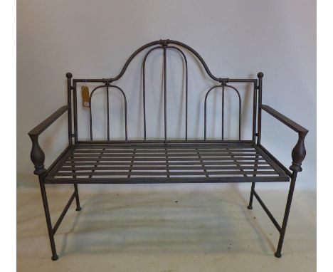A contemporary metal garden bench, H.101 W.113 D.53cm 