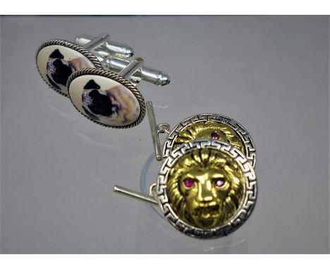 Two pairs of sterling silver cufflinks: one pair containing oval porcelain panels of pug dogs, the other plated with yellow g