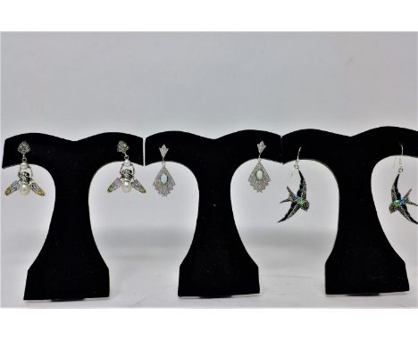 3 pairs of sterling silver earrings: white sapphire and opalite example, blue/green enamel and marcasite bird example and bee