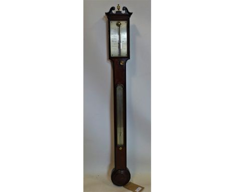 A Regency mahogany stick barometer, the silvered dial marked Cary London, with broken swan neck pediment and ivory finial, H.