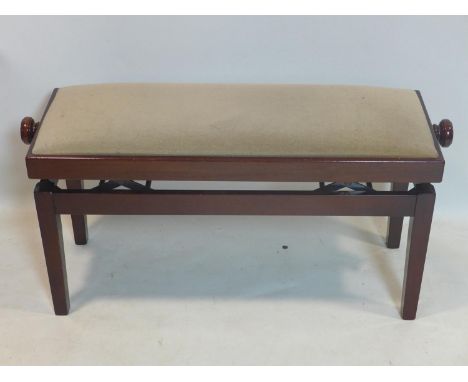 A mahogany adjustable duet piano stool with velour upholstered seat 