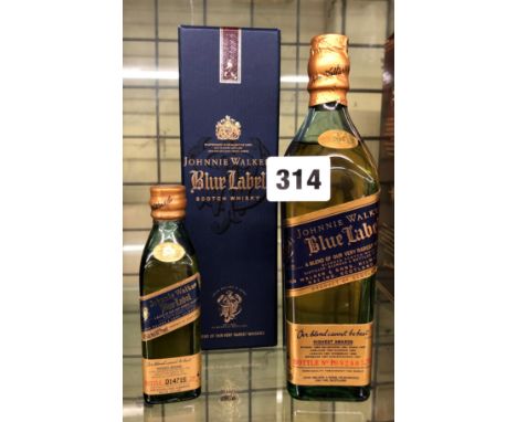 VINTAGE BOXED JOHNNIE WALKER BLUE LABEL SCOTCH WHISKY 20CL BOTTLE NO. PO92807W AND A MINIATURE 50ML BOTTLE NO. D14715JW