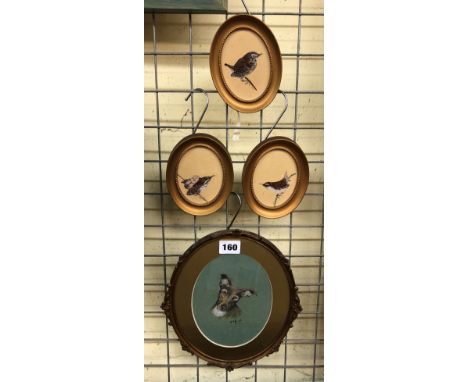 THREE SMALL OVAL MINIATURE PAINTINGS OF BIRDS AND A CHARCOAL SKETCH OF A DOG'S HEAD