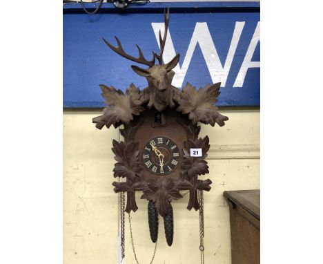 CUCKOO CLOCK WITH TWO WEIGHTS AND PENDULUM
