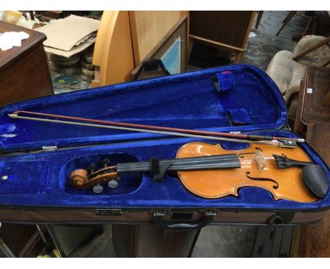 Stentor Student II violin and bow in case together with a metronome and box of sundries 