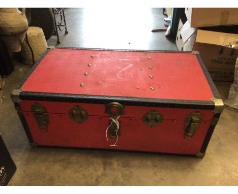 Large red trunk, together with some brass rubbings