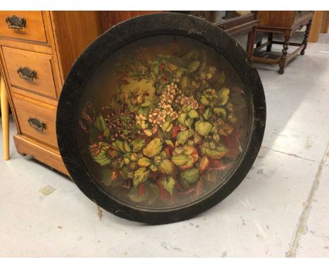 Large ceramic charger painted with flowers, signed on the back, in ebonised frame, 63.5cm diameter including frame