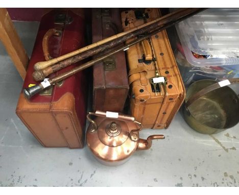 Silver topped simulated bamboo cane, Japanese bamboo cane and another cane, together with three leather suitcases, a brass pr