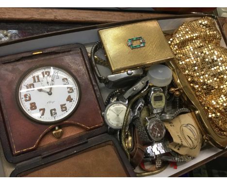 1920's eight day travelling clock in leather case, together with various wristwatches and other items