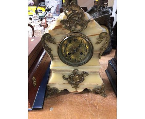 Ornate onyx and gilt metal mantel clock
