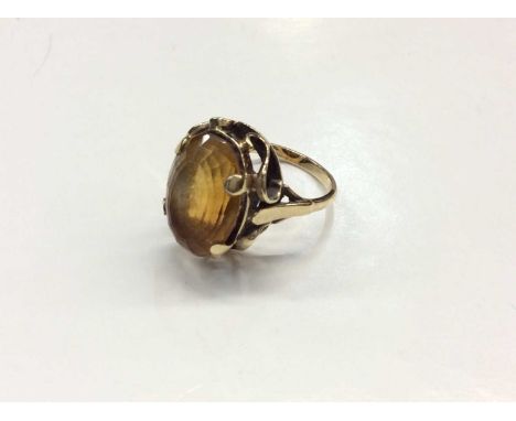 9ct gold oval cut citrine ring, size M½Condition report: Shank stamped 9ct and weighs 5.9 grams