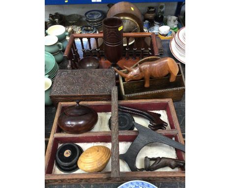 Various wooden items, including turned vessels, carved cutlery tray, figures, mantel clock, etc