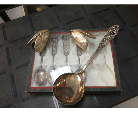 Pair of silver plated mussel shells, four white metal teaspoons and a silver (830) serving spoon