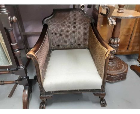 Edwardian carved mahogany bergere sofa and armchair