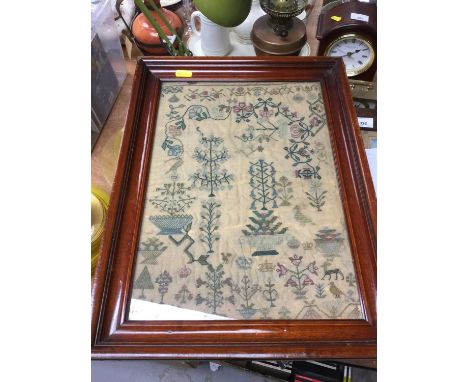 19th century needlework sampler in glazed frameCondition report: Some runs to the fabric on the lower half and right side. A 