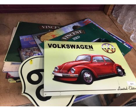 Collection of reproduction classic car and motorbike enamel signs