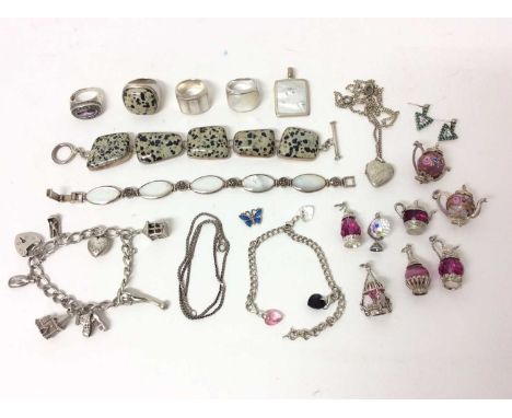 Group silver and white metal jewellery including charm bracelet, various glass charms, mother of pearl rings, pendant and bra