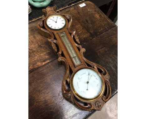 Oak carved combination barometer, clock and thermometer