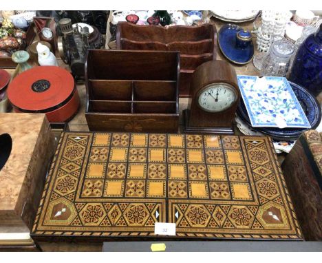 Decorative inlaid backgammon box and accessories, inlaid stationary rack, another and an Edwardian inlaid mantel clock (4)