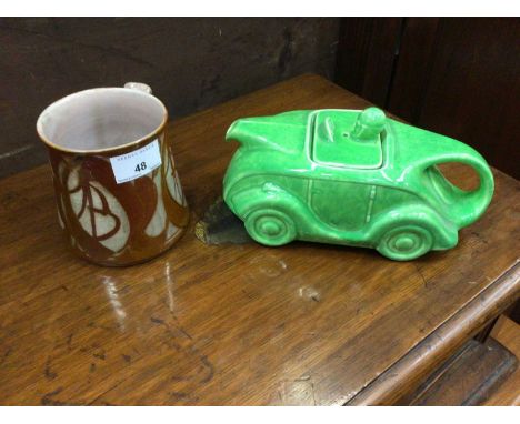 Alan Caiger-Smith glazed mug together with a Sadler green glazed car shaped teapot